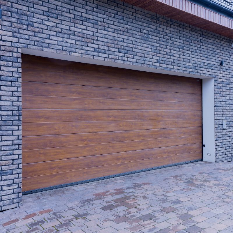 Proper installation of weather stripping can greatly enhance our garage’s energy efficiency and security. 